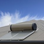 Tan metal roof with solar hot water system