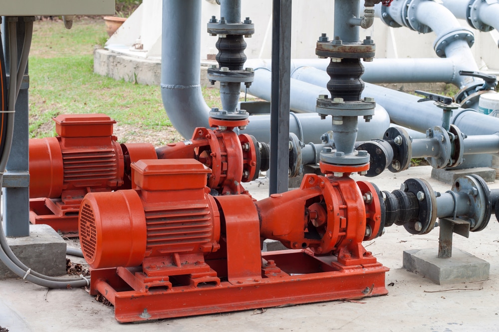 red water pump motor and pipes